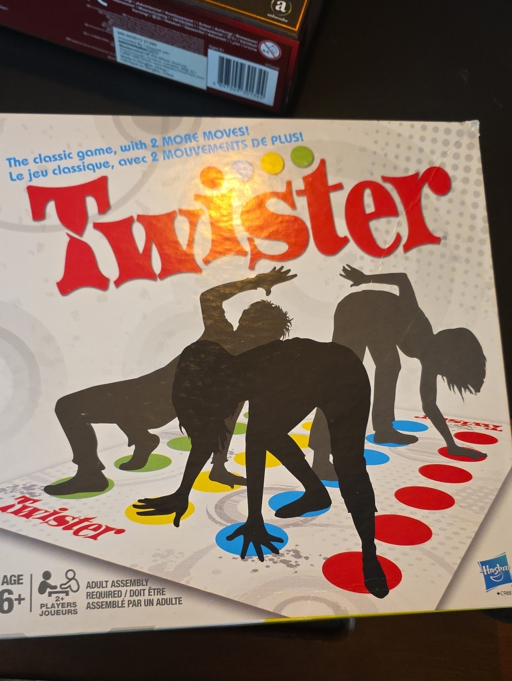 Hasbro Twister Game - Red, Blue, Yellow, Green Dots on White Box